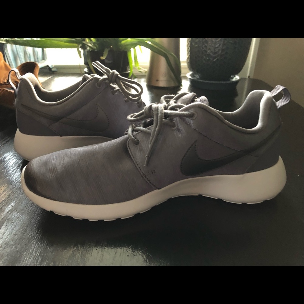 Silver Nike Tennis Shoes, Brand New, never worn.